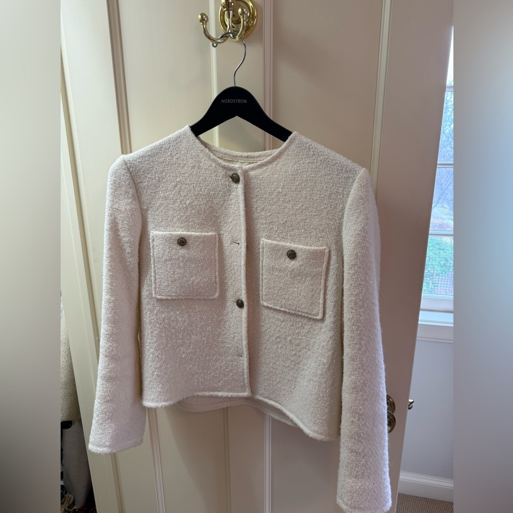 Fitted cream jacket with gold buttons